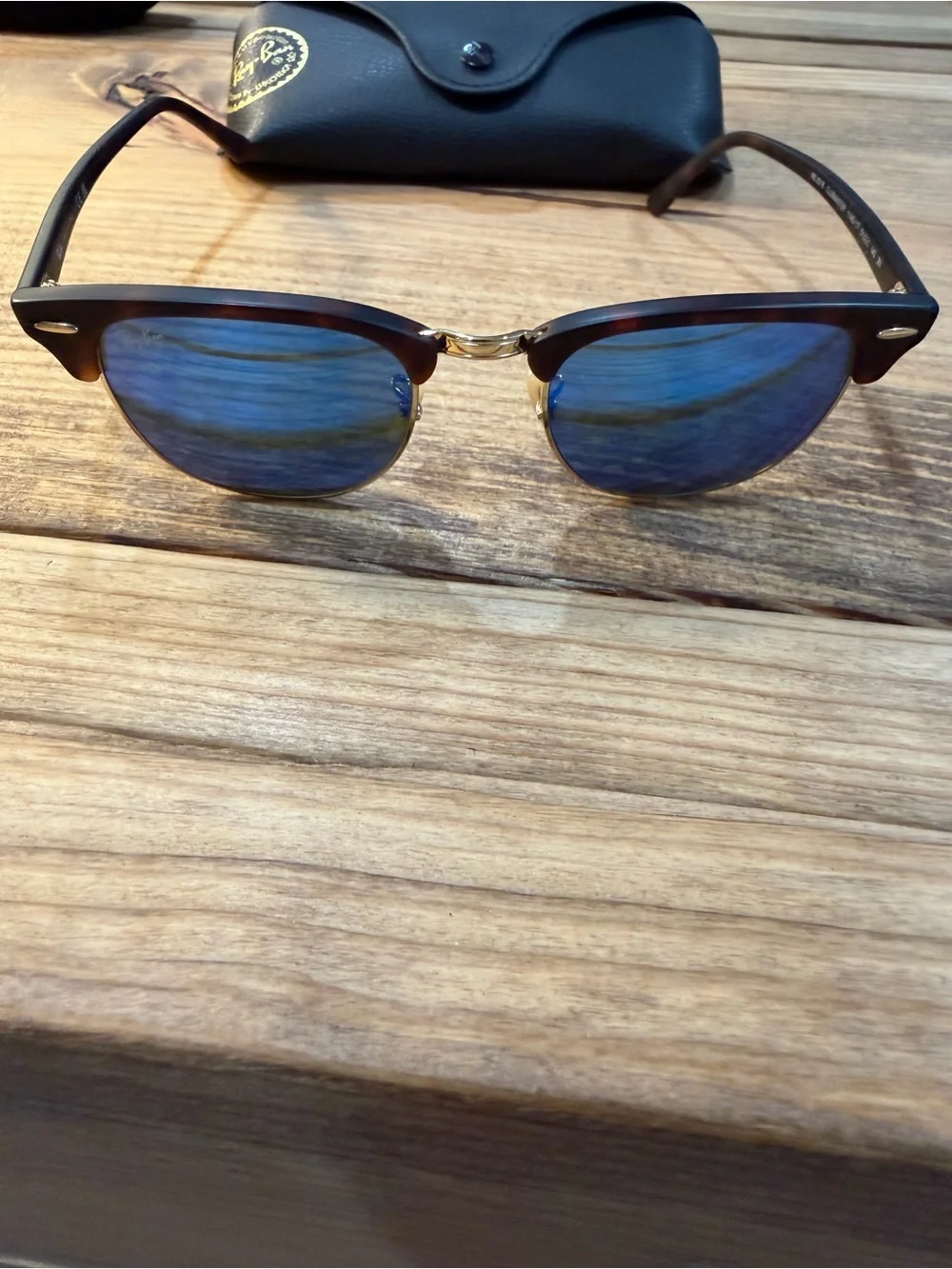 Ray-Ban Clubmaster Sunglasses with Tortoiseshell Frame and Blue Lenses
